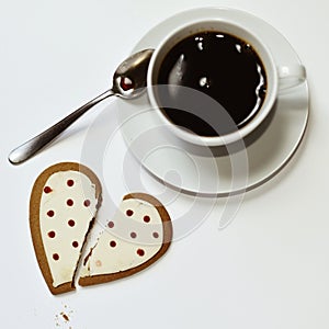 Coffee and heart-shaped cookie