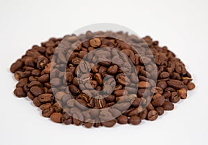 Coffee. Hill coffee beans on a white background.