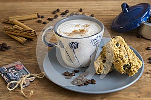 Coffee and home-made rusks on wood.