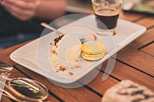 Coffee, ice cream and macaron cookies