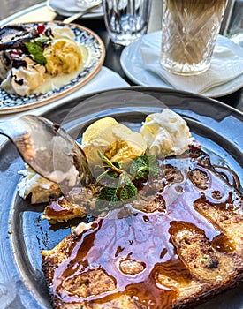 Coffee with ice cream and whipped cream on the table in Paris, France.