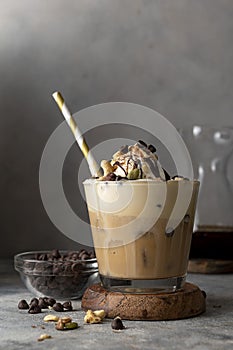 Coffee and ice crem with chocolate and coffee beans in glass, copy space