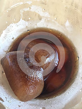 Coffee ice cubes in iced coffee drink