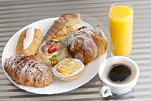 Coffee, juice and pastry