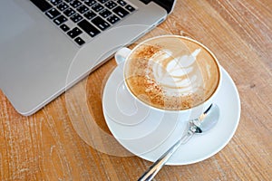 Coffee with labtop on the table