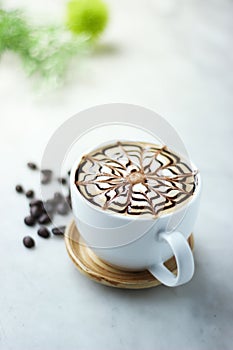 Coffee latte art with beautiful window light.