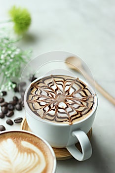 Coffee latte art with beautiful window light.