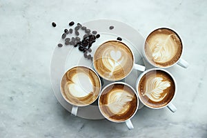 Coffee latte art with beautiful window light. Top view.