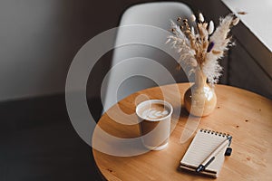 Coffee latte art on wood table