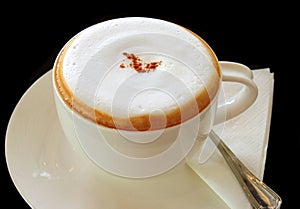 Coffee latte or cappuccino in a cup