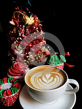 Coffee latte with christmas muffins