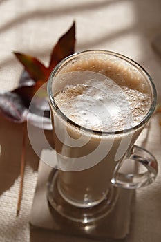 Coffee latte macchiato in tall glass photo