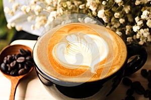 Coffee Latte Milk cream flower Wooden spoon coffee bean Background Wood