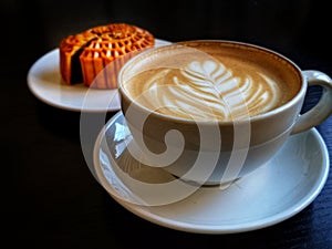 Coffee latte with mooncake