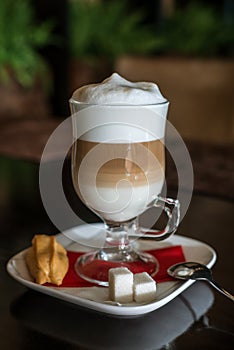 Coffee Latte in Transparent Glass silver in Cafe, Latte Macchiato photo