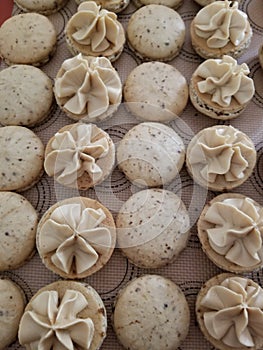Coffee macarons ready to be assembled.