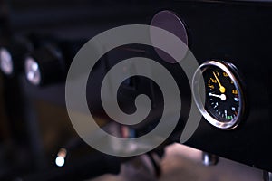 Coffee machine in coffee on a blurred background.