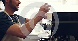 Coffee machine, cup and barista man in cafe making morning caffeine beverage, latte or espresso for diner order. Service