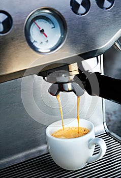 Coffee machine dispensing coffee