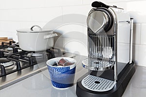 Coffee machine on a kitchen benchtop in a home