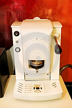 Coffee machine maker. Espresso machine, close-up. A professional coffee maker in a cafe. Cappuccino, macchiato, espresso coffee. photo