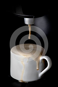 Coffee machine pouring coffee