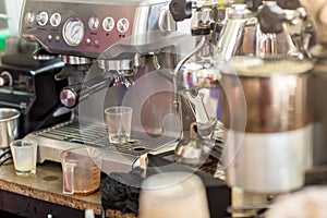 Coffee machine ready to make good a cup of espresso in cafe. coffee machine making a cup of coffee in restaurant.