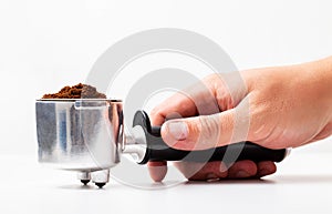 Coffee maker horn in hand on white background, close-up, isolated