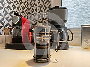 Coffee makers of three different types, isolated.