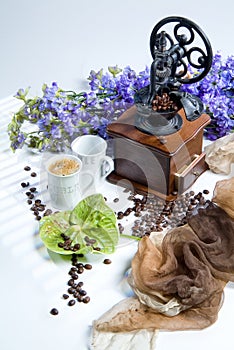 Coffee Mill, Cup and Coffee Beans