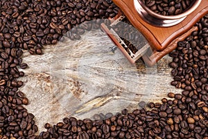 Coffee mill and frame of coffee beans, top view