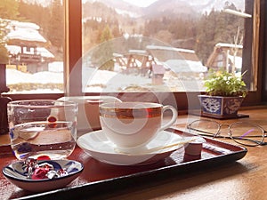 Coffee in the morning  and enjoying the winter snow view at Shirakawago village, Gifu, Japan