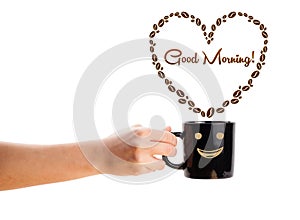 Coffee mug with coffee beans shaped heart with good morning sign