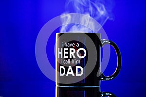 Coffee mug with dad is my hero inscribed