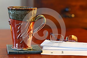 Coffee mug on desk
