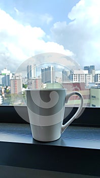 Coffee mug from hotel window