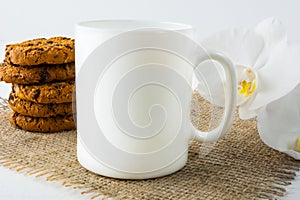 Coffee mug mockup with cookies