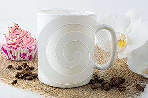 Coffee mug mockup with muffin