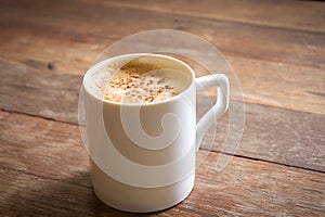 Coffee mug on wood table