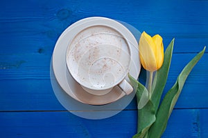 Coffee mug with yellow tulip flowers