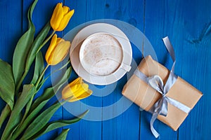 Coffee mug with yellow tulip flowers and gift