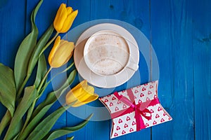 Coffee mug with yellow tulip flowers and gift