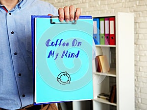 Coffee On My Mind sign on the piece of paper