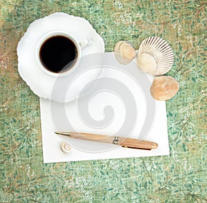 Coffee with Paper, Pen and Shells