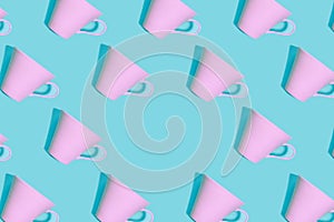 Coffee pattern of pink cup for coffee on bright blue background