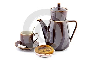 Coffee pot, cup and saucer and appel pie