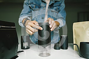 Coffee preparation, using Automatic grinder ground coffee beans, light roast Arabica, maker at home