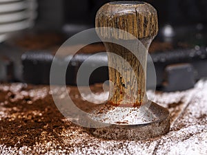 Coffee press being used to make Expresso at a coffee shop