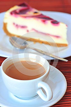 Coffee with raspberry cream cheesecake