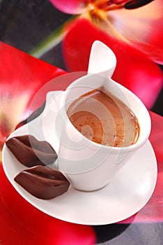 Coffee with red chocolate lips